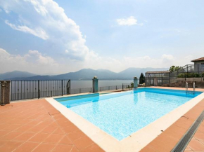  Panoramic house in a residence upon the green hills overlooking Lake Maggiore  Оджеббио